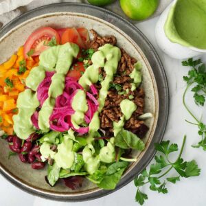 Healthy Ground Beef Taco Salad Recipe with Avocado Lime Dressing