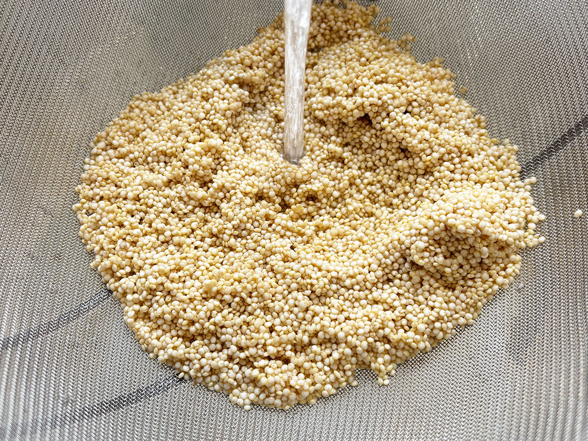 Rinsing quinoa in a sieve