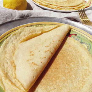 Close up of crepes on green plate