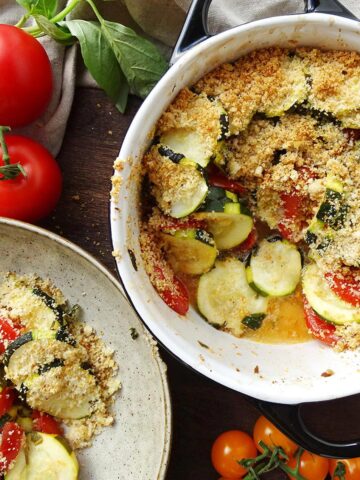 Gluten Free Tomato and Zucchini Au Gratin in a serving dish