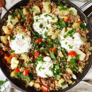 Top view high protein breakfast scramble with ground beef and eggs