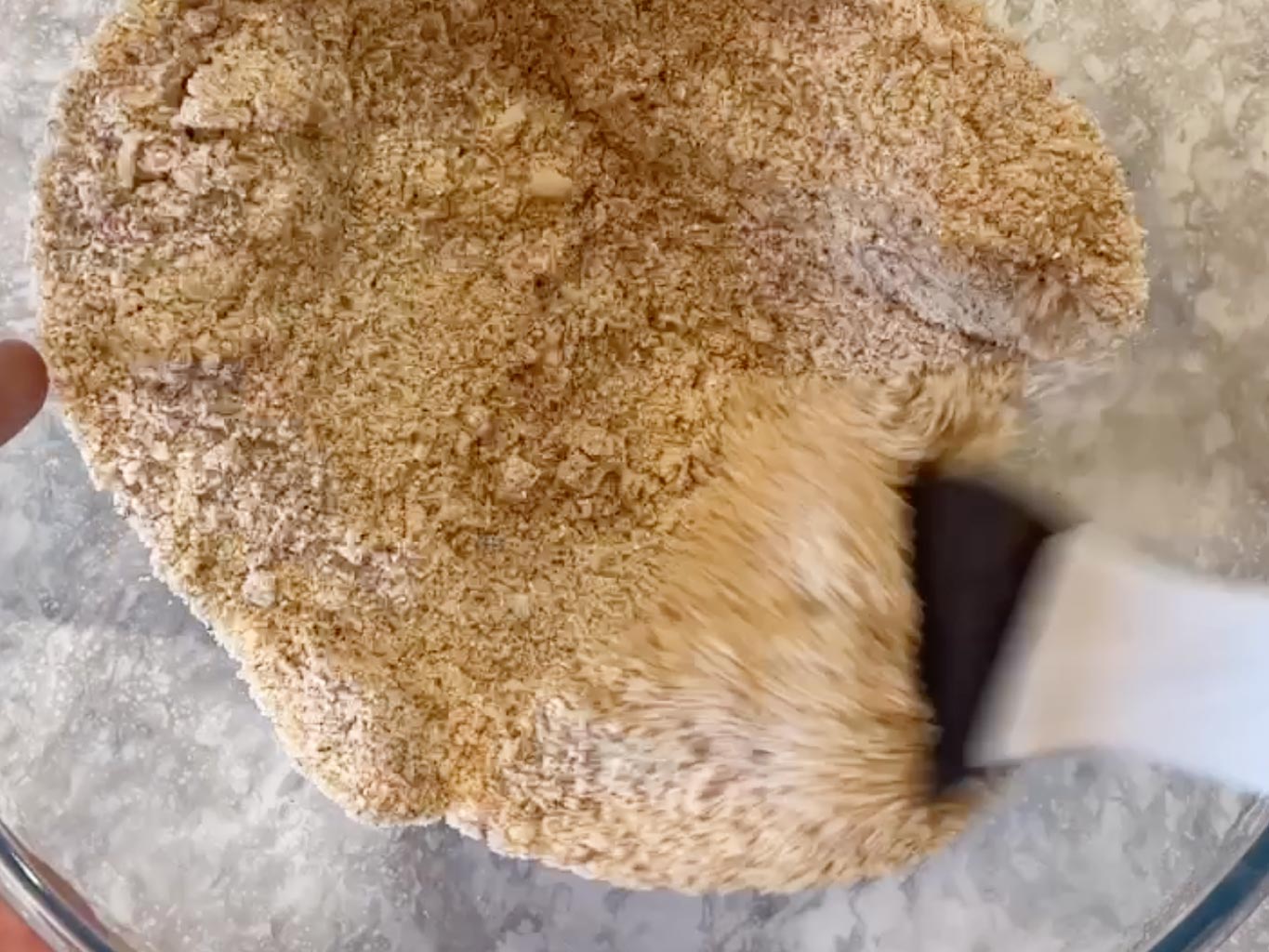 Stirring together candida diet bread dry ingredients