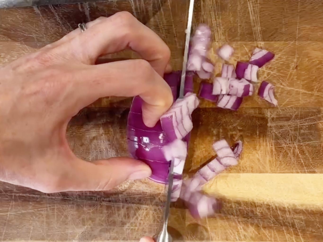 6. Finely slice the red onion and leave to soak in water while you prepare the other ingredients